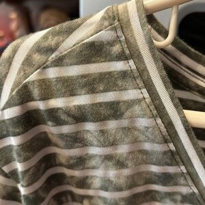 Cute green striped shirt.